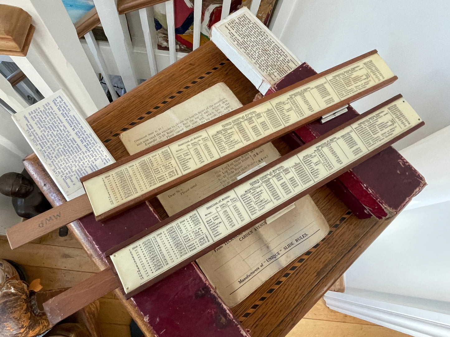Antique English “Unique” Universal Slide Rules – Boxed Pair with Original Instructions (c.1930s–1950s)