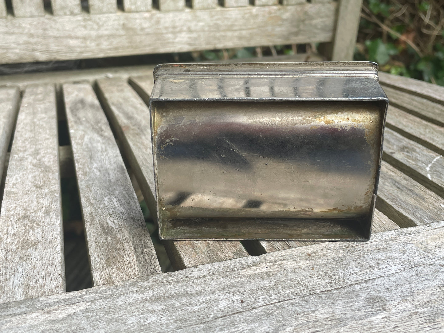 Vintage white metal trinket box with dragon and foliage design