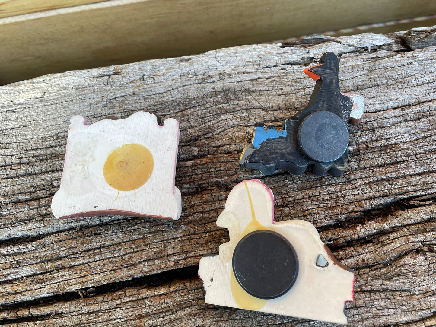 Three ceramic Wallace and Gromit vintage fridge magnets starring Feathers McGraw c1995