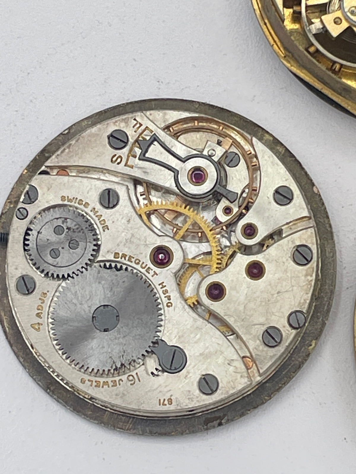 Vintage Mixed Lot of Pocket Watch Movements: J.W. Benson London, G. & T. Young New Zealand & Jay's Essex Road Spare Parts