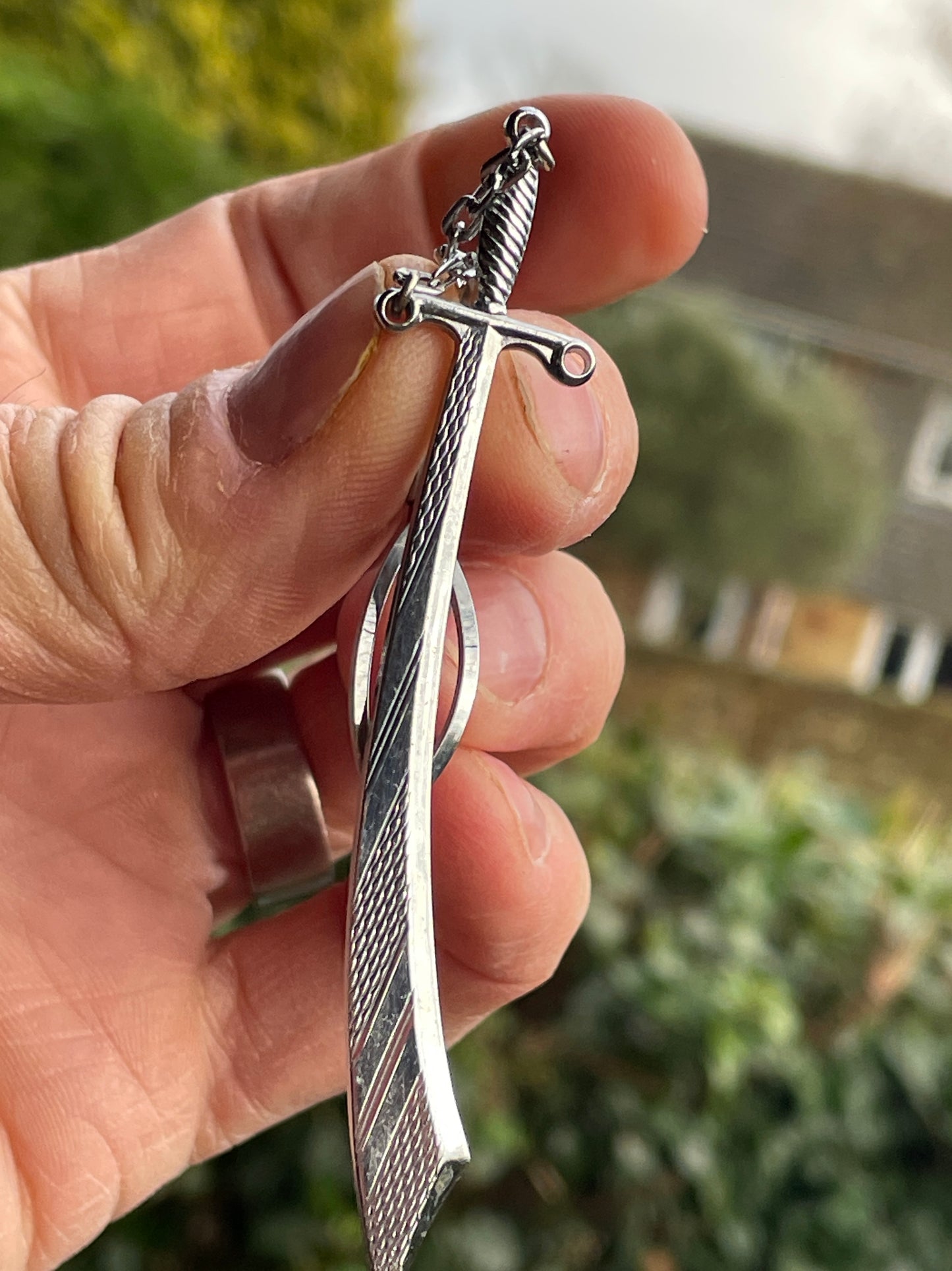 Vintage Stratton imitation curved broad sword tie clip made in England 9cm long