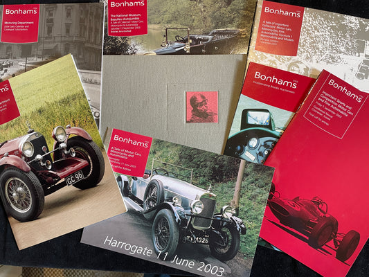 Eight Bonhams motor automotive brochures and pamphlets advertising pending automotive auctions