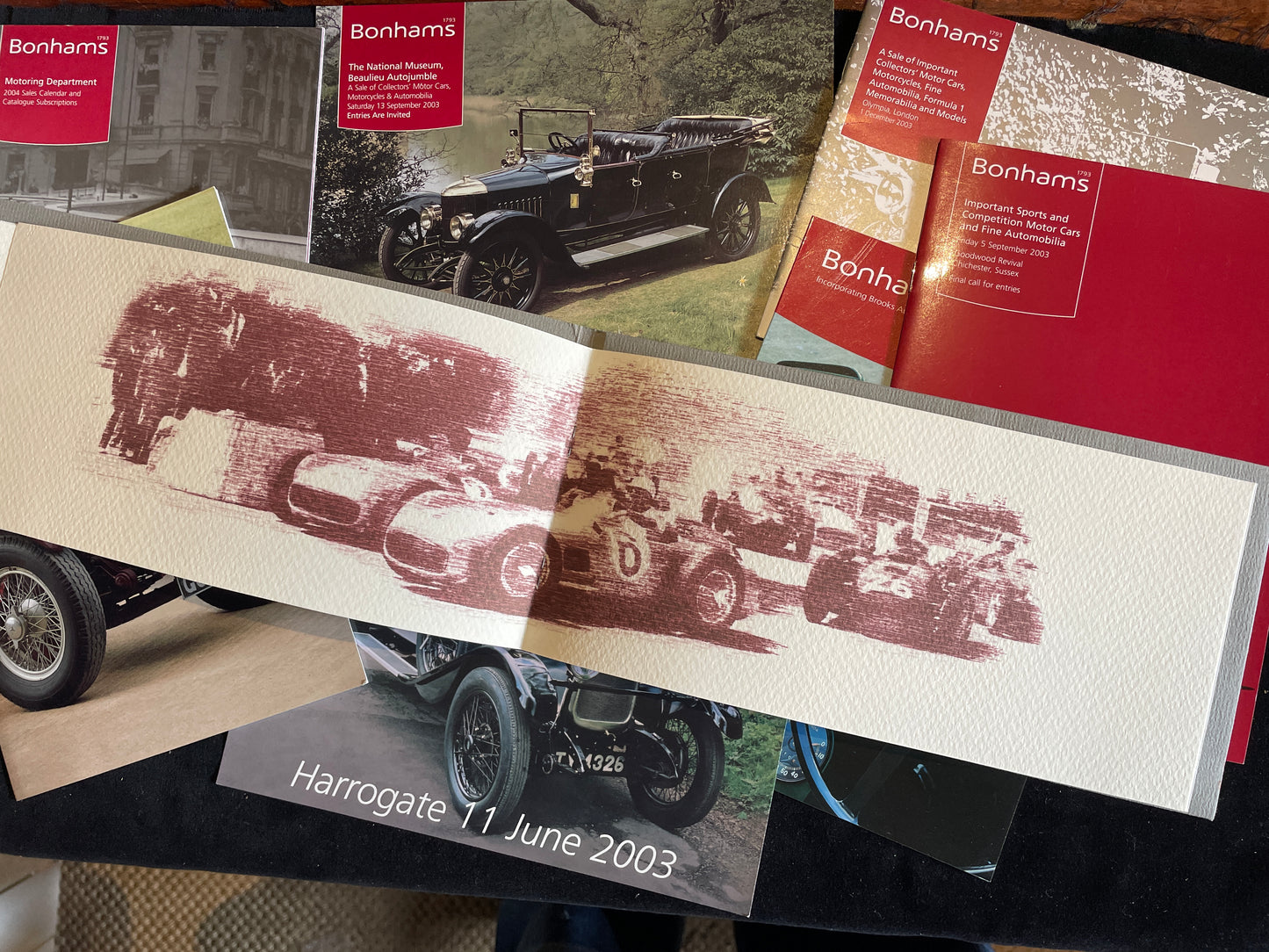 Eight Bonhams motor automotive brochures and pamphlets advertising pending automotive auctions