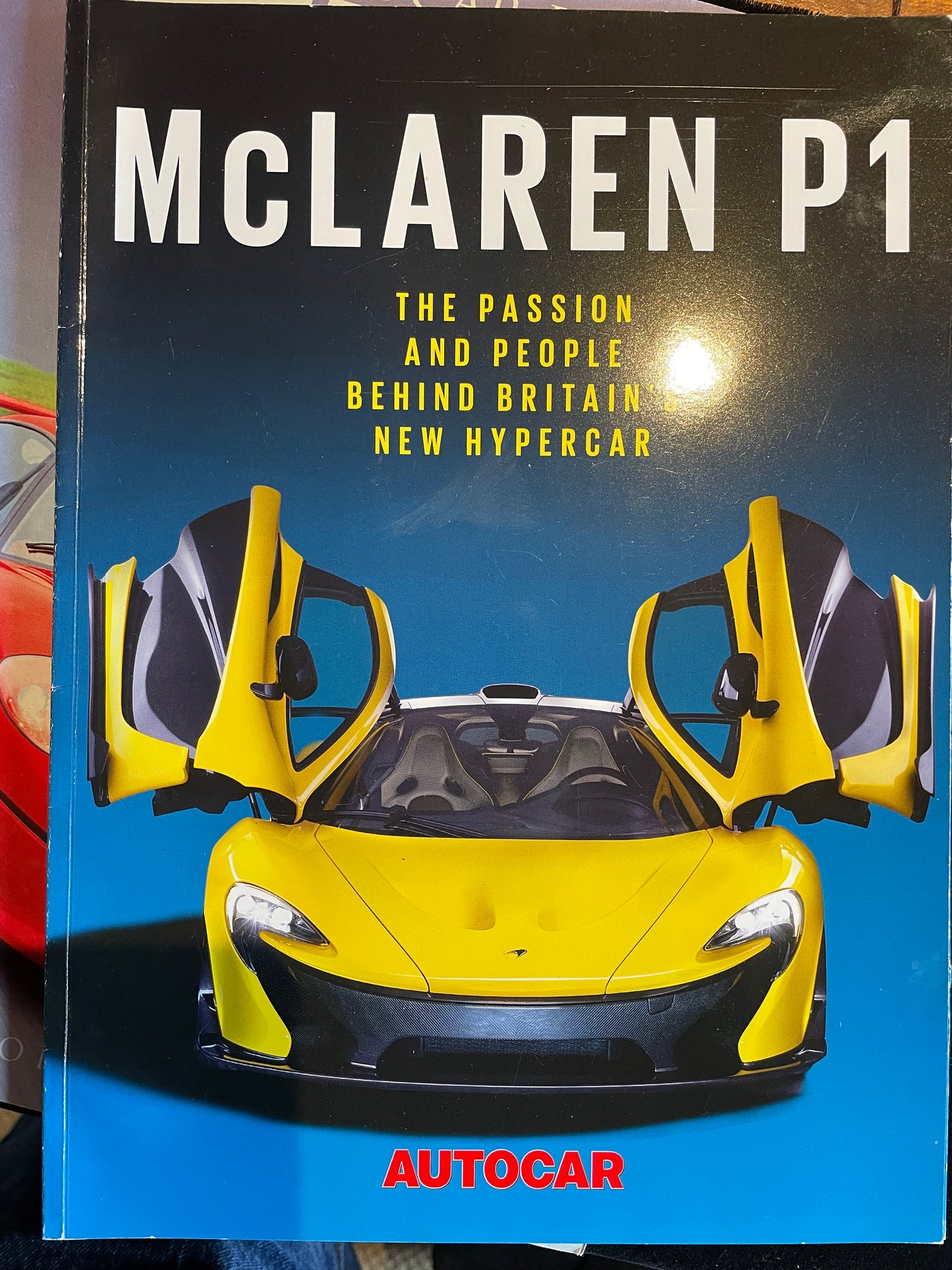 Three Hyper car brochures from Ferrari and McLaren