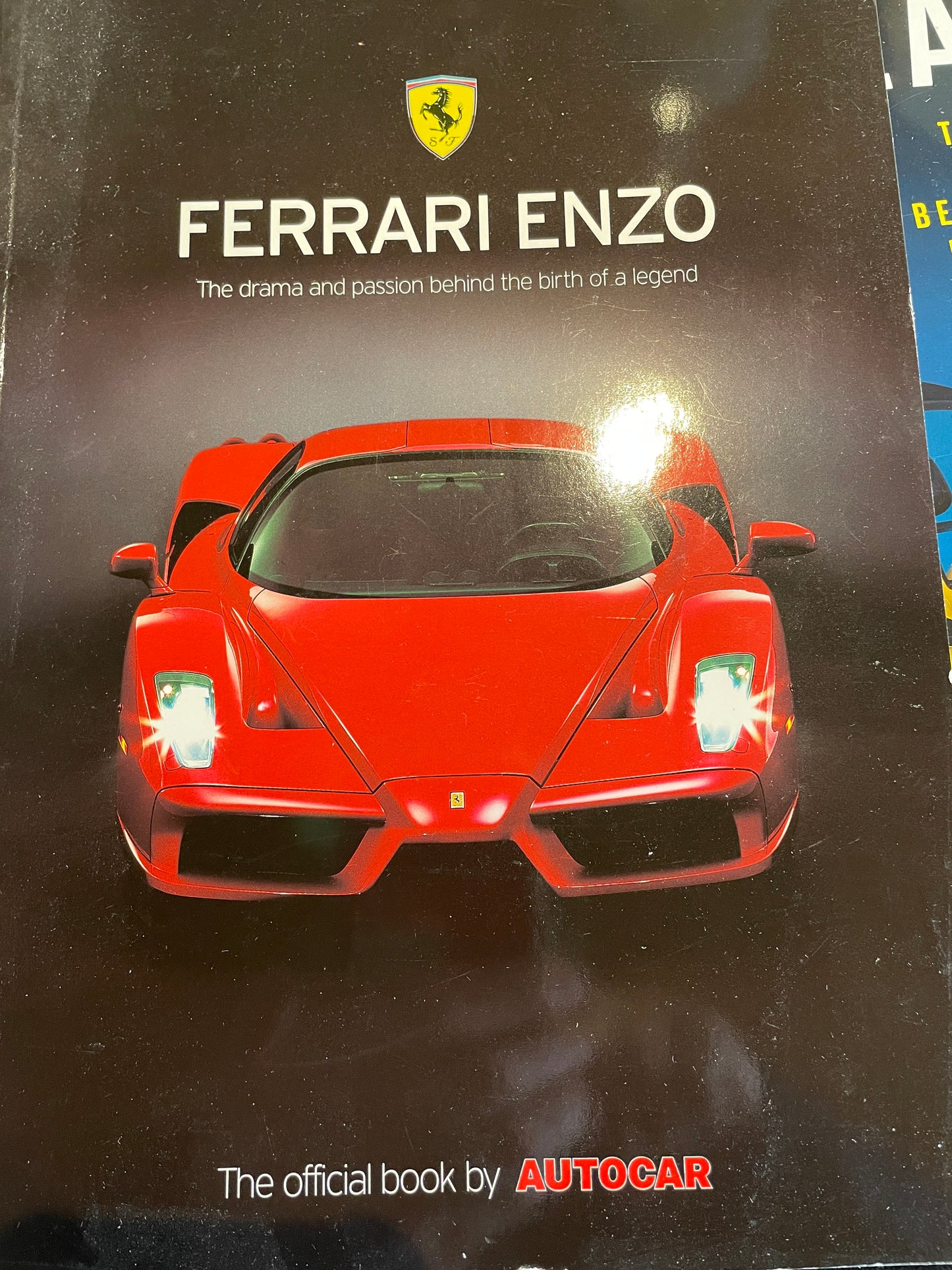 Three Hyper car brochures from Ferrari and McLaren