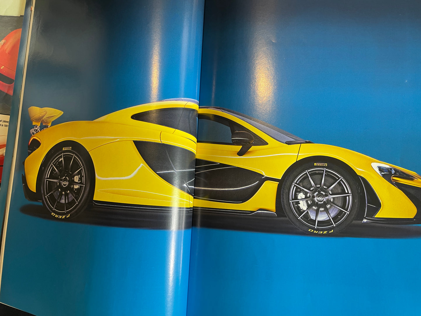 Three Hyper car brochures from Ferrari and McLaren