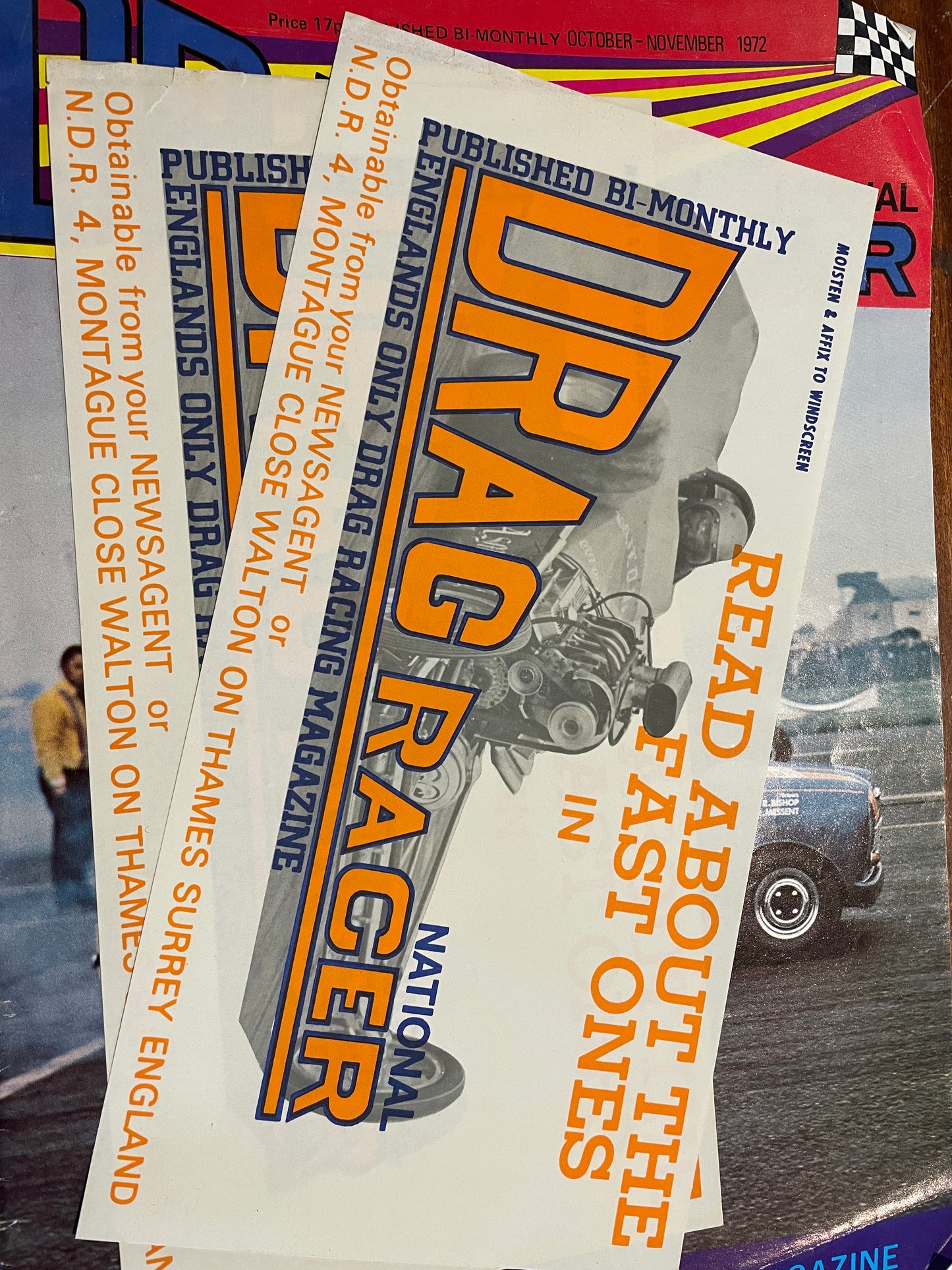 An original vintage National Drag Racer magazines from 1972 and two rare car stickers