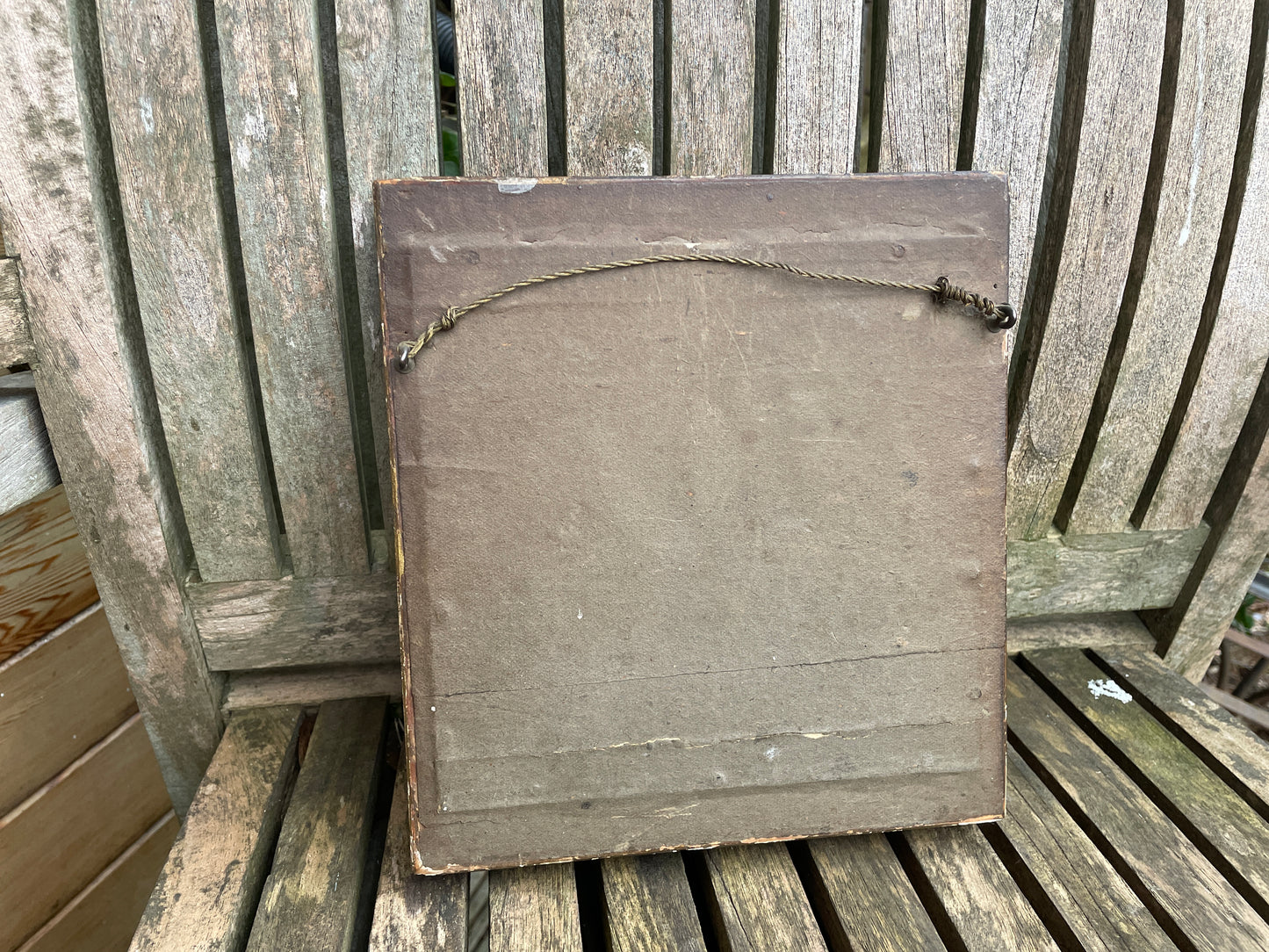 Antique watercolour miniature on ceramic cushion frame surround mounted in a giltwood and gesso decorated frame