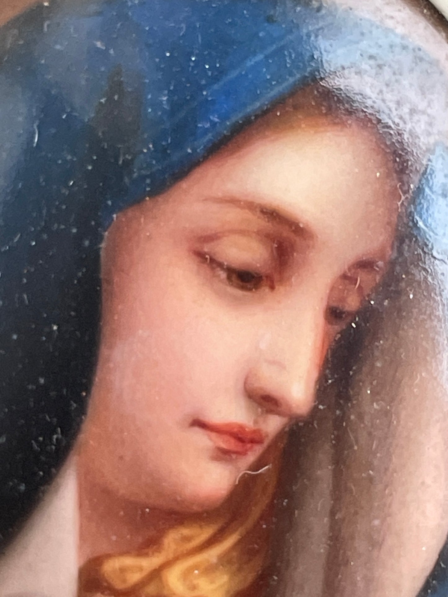 Antique watercolour miniature on ceramic cushion frame surround mounted in a giltwood and gesso decorated frame