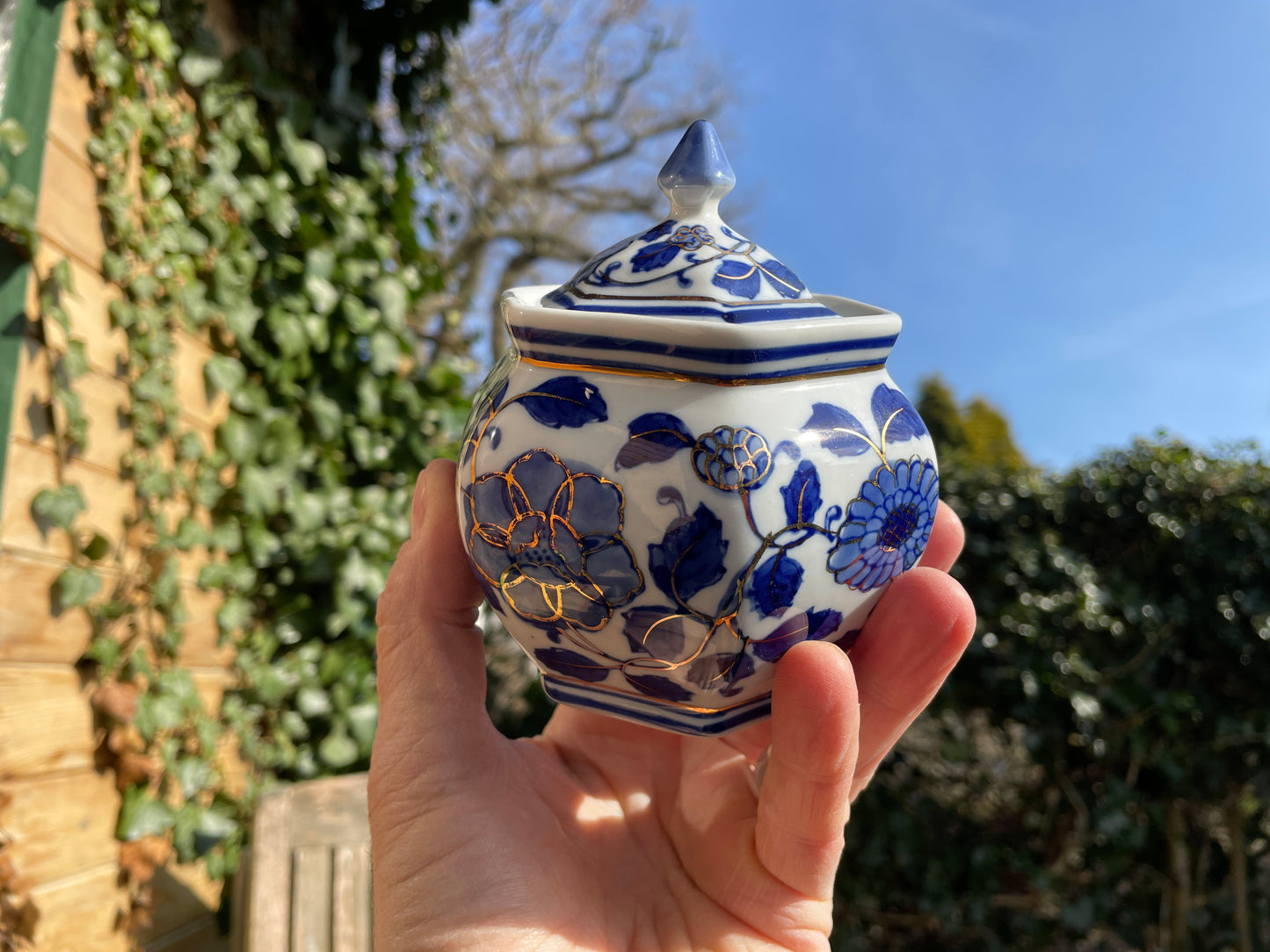 Hexagonal porcelain hand painted gilded oriental lidded pot 12cm tall
