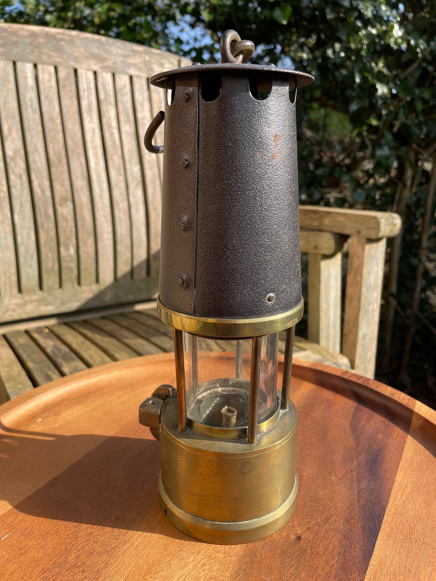 Antique brass miners lamp called The Protector lamp and lighting Co of Eccles Manchester
