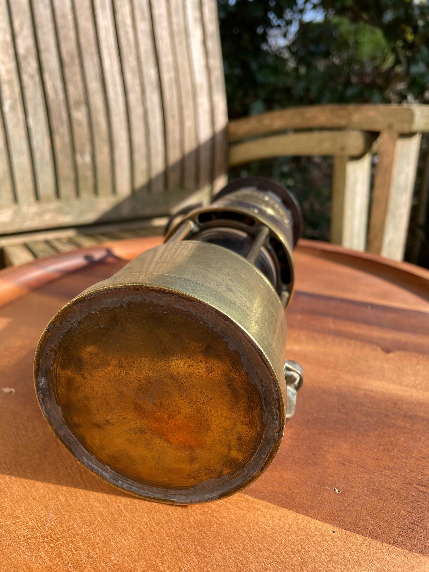 Antique brass miners lamp called The Protector lamp and lighting Co of Eccles Manchester
