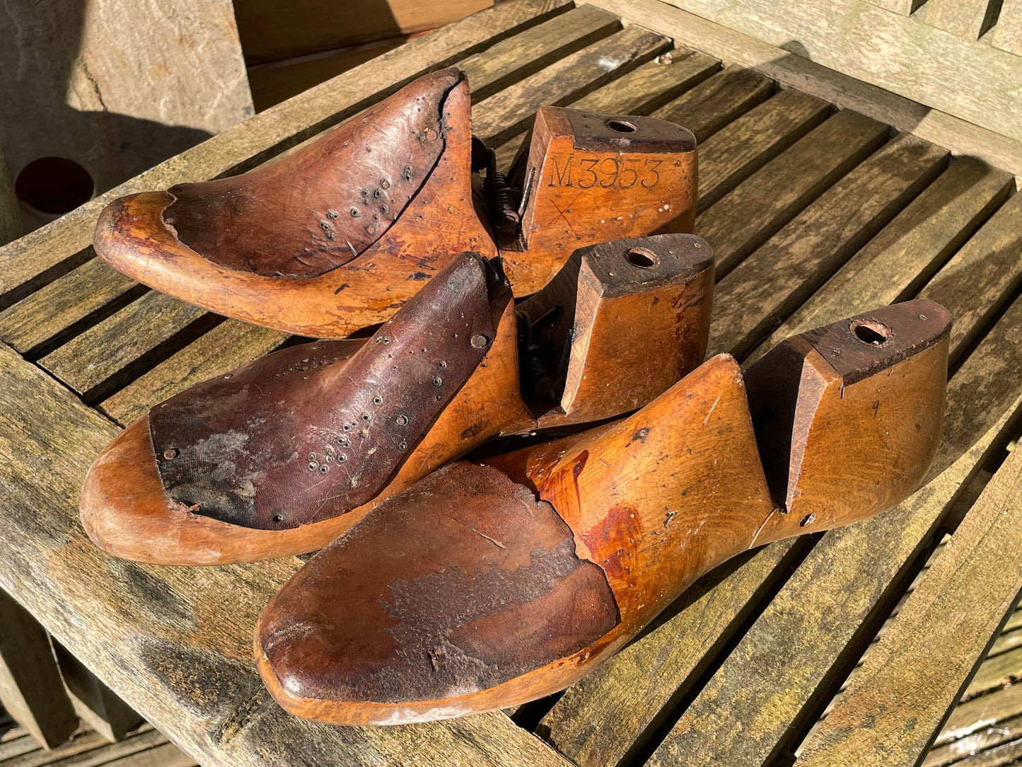 Antique Cobbler's wooden shoe lasts or formers with original leather patches and metal soles