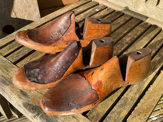 Antique Cobbler's wooden shoe lasts or formers with original leather patches and metal soles