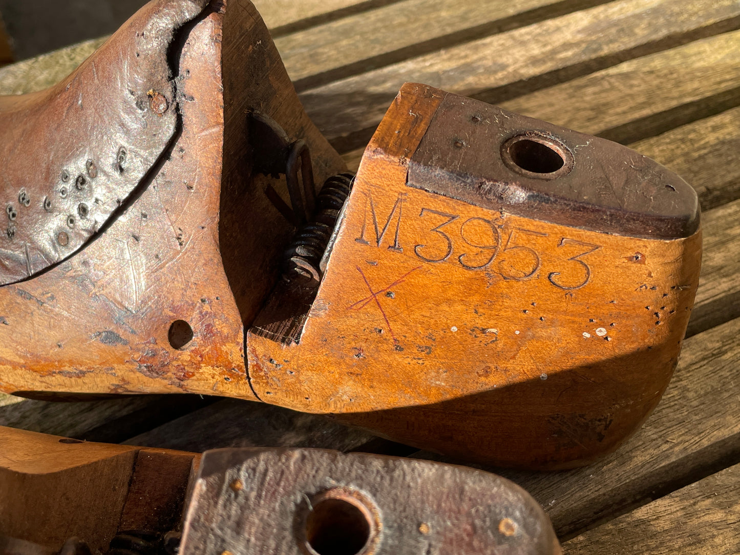 Antique Cobbler's wooden shoe lasts or formers with original leather patches and metal soles