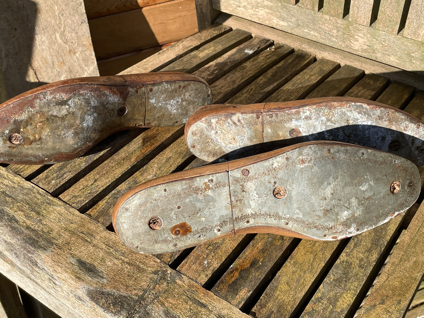 Antique Cobbler's wooden shoe lasts or formers with original leather patches and metal soles
