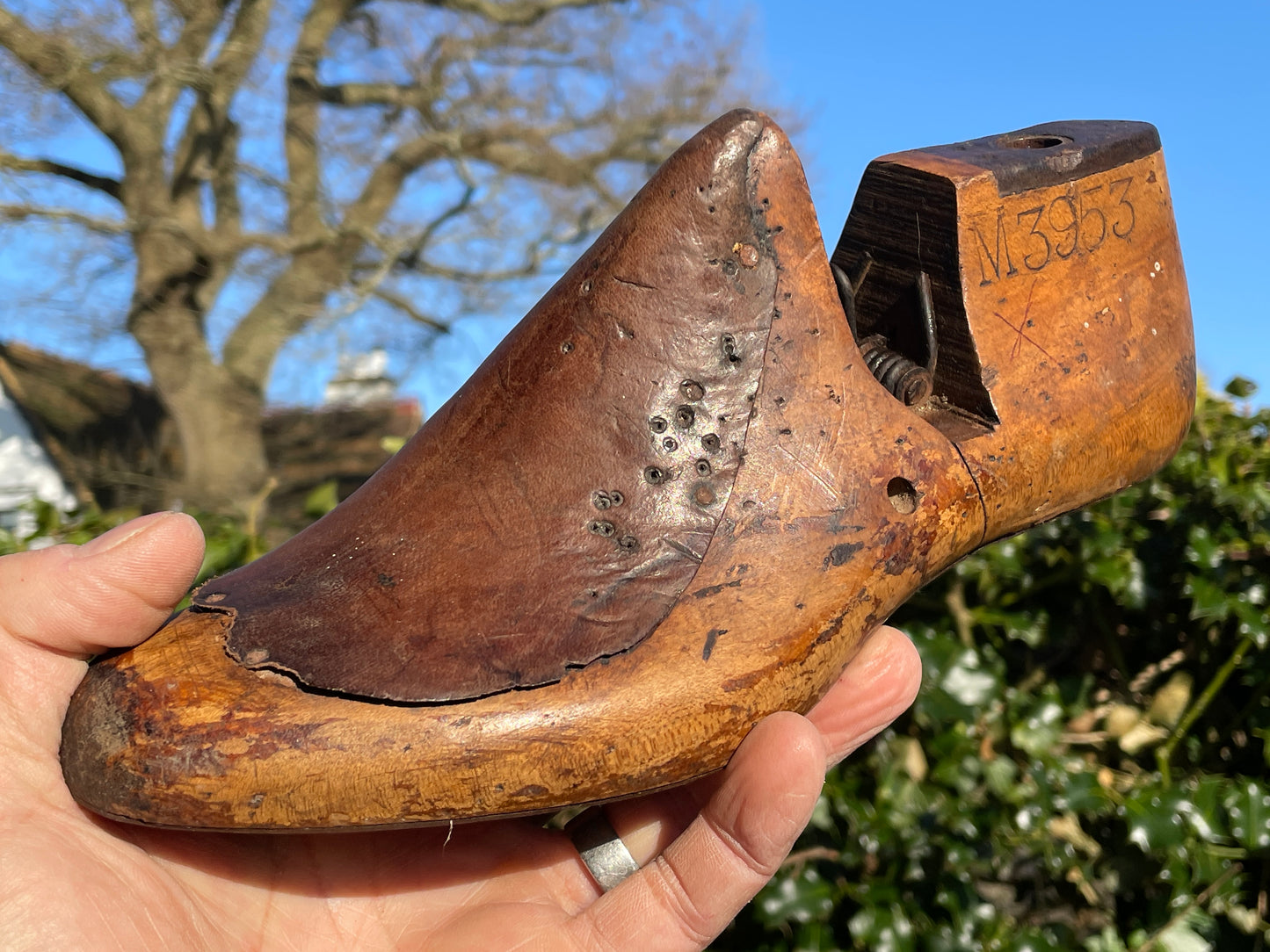 Antique Cobbler's wooden shoe lasts or formers with original leather patches and metal soles