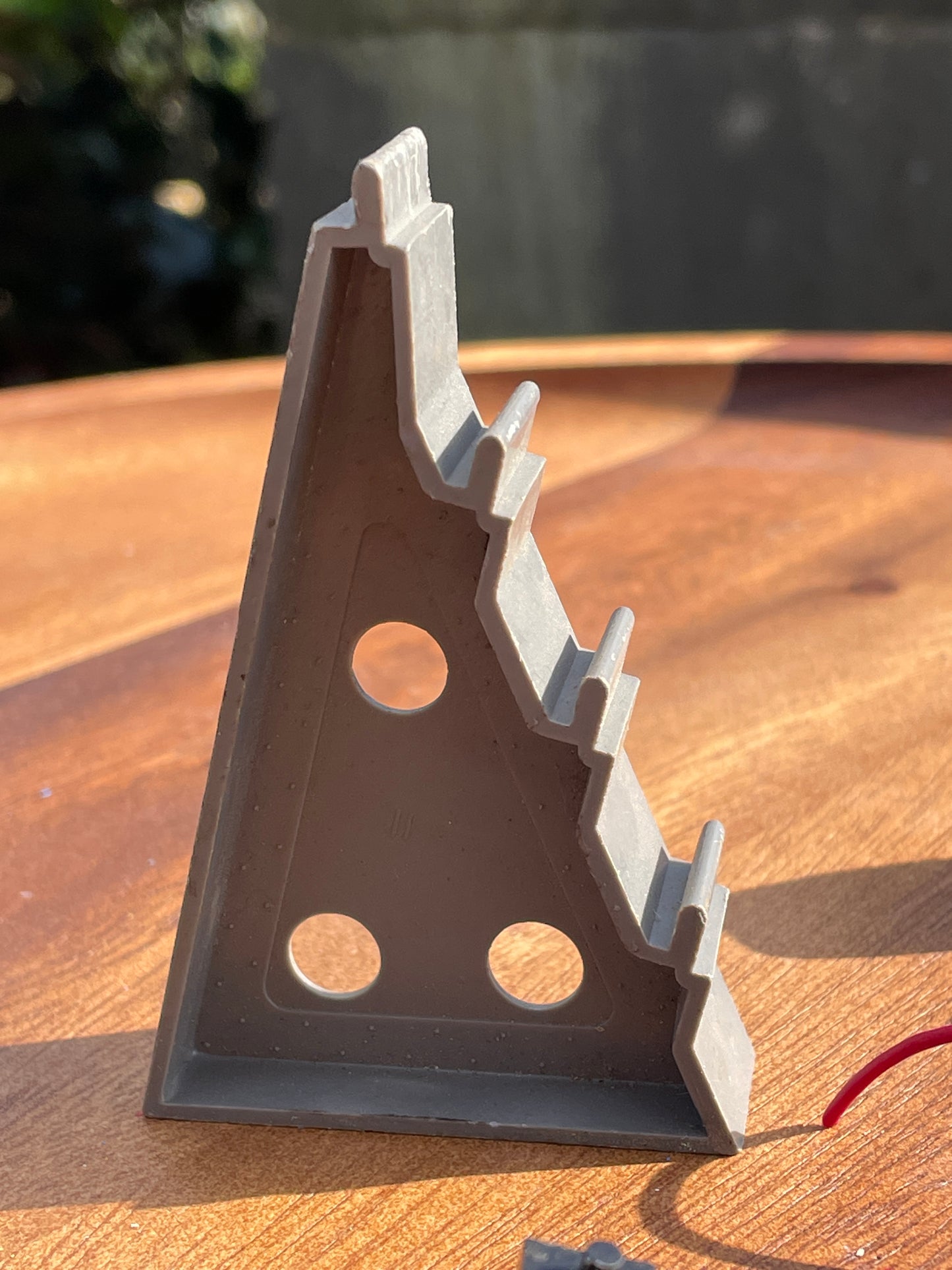 Original 70's Scalextric spares rear axil, motor and contact bushes, banked corner prop