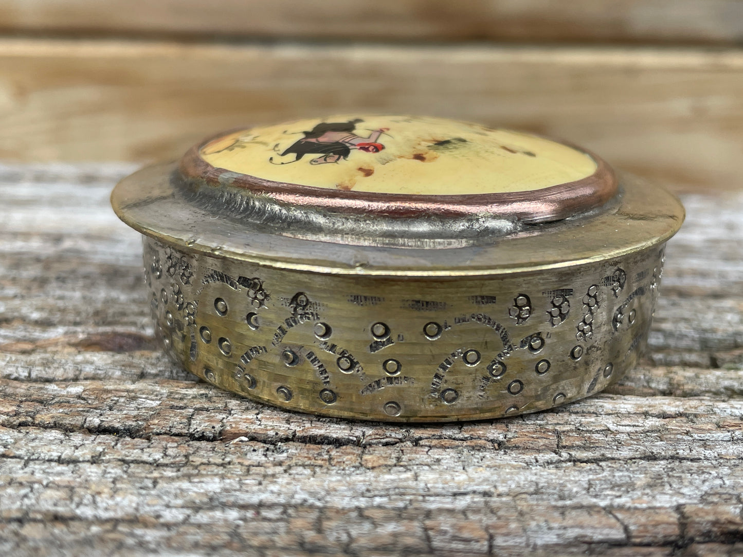 Vintage brass and ceramic powder box, pill box with Persian hunter riders chasing their game, hand painted