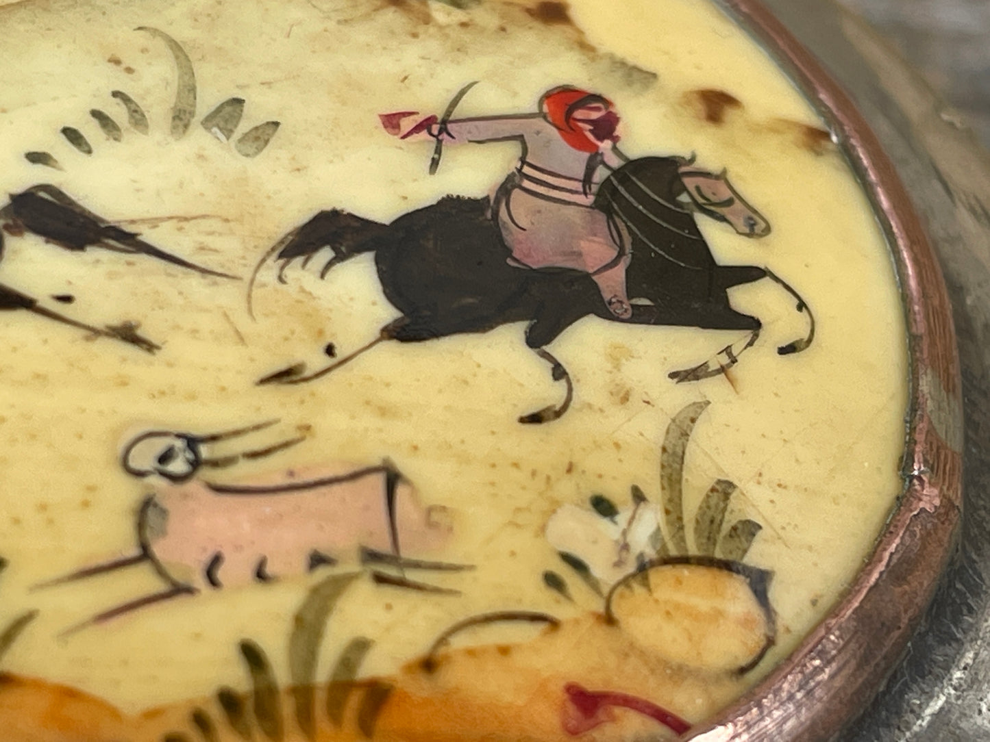 Vintage brass and ceramic powder box, pill box with Persian hunter riders chasing their game, hand painted