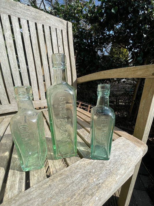 Three ESS Camp Coffee and chicory bottles two Glasgow and one Edinburgh