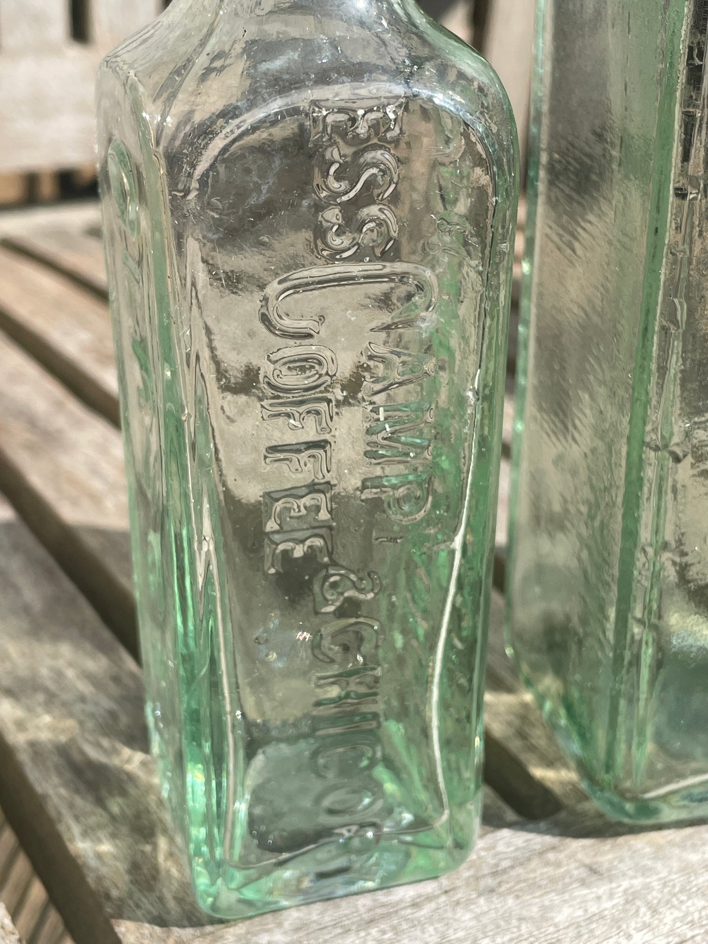 Three ESS Camp Coffee and chicory bottles two Glasgow and one Edinburgh