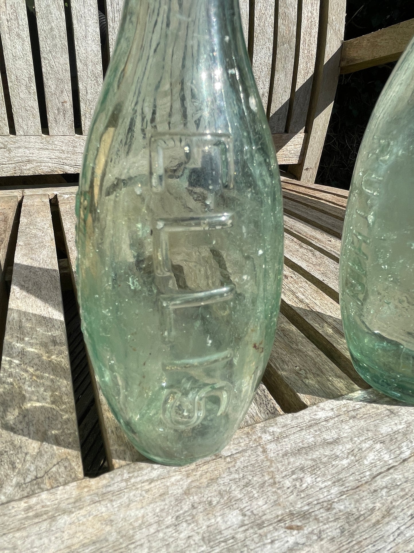 Two Victorian Ellis Ruthin Torpedo mineral water clear glass bottles c1890