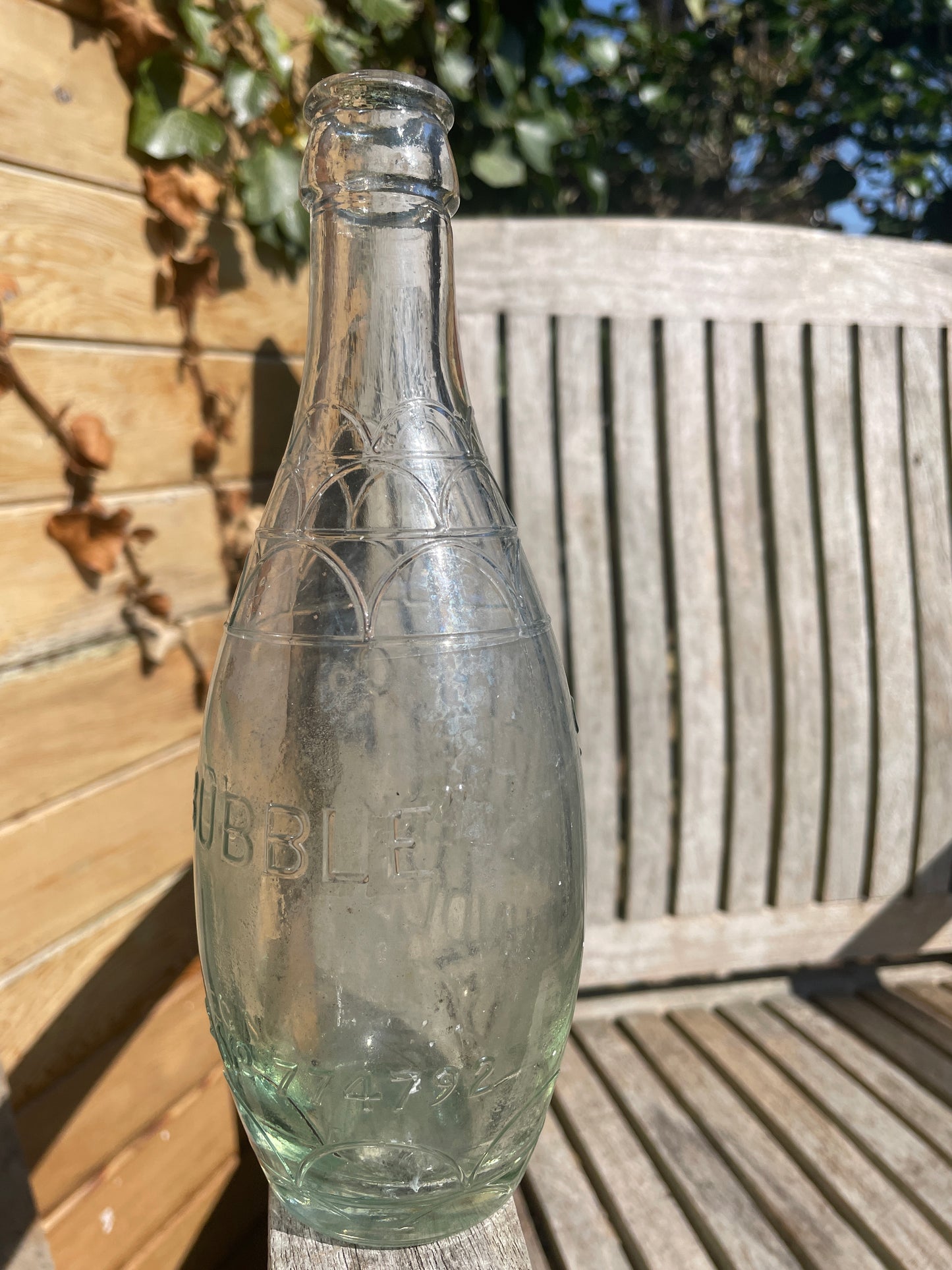 Original decorative Smith and Co. The Brewery Oundle torpedo shaped clear glass bottle 1938
