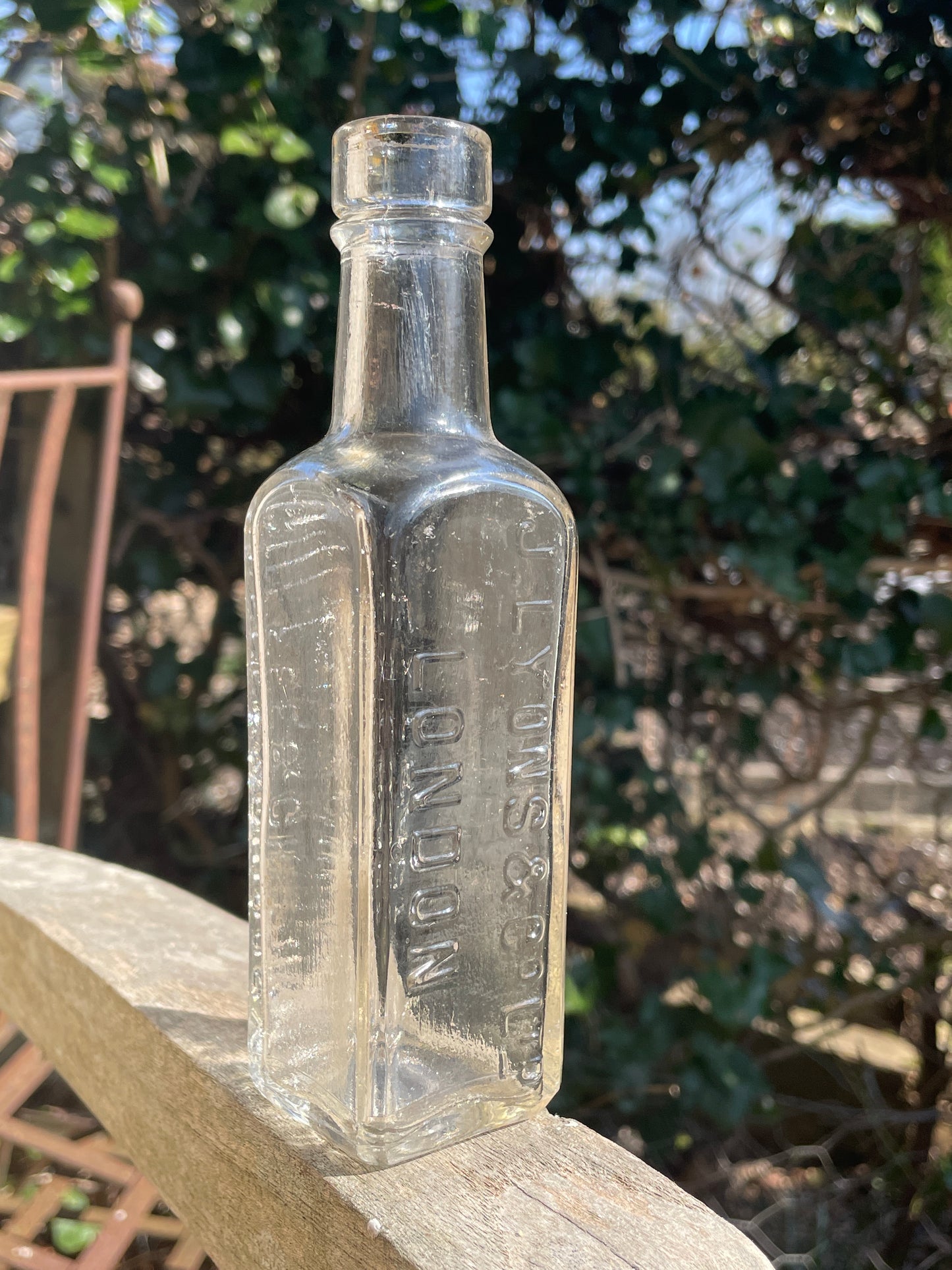 Antique J Lyons and Co. London Coffee and Chicory extract clear glass bottle
