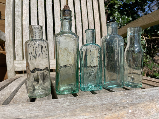 Five Antique and vintage small bottles incl. Masons Extract and Owbridge's Lung Tonic Hull examples