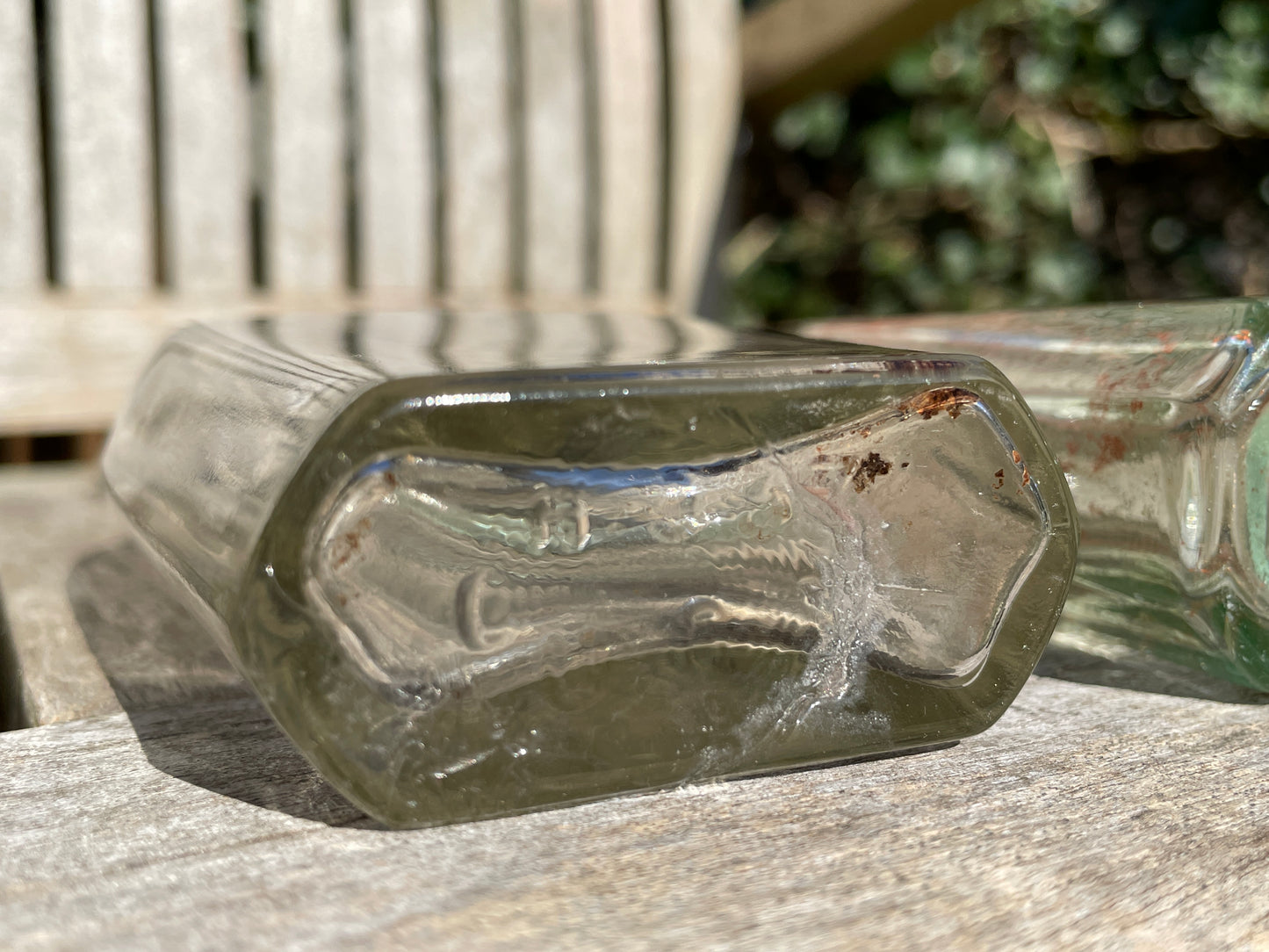 Yates's Wine Lodge and two other long necked antique bottles