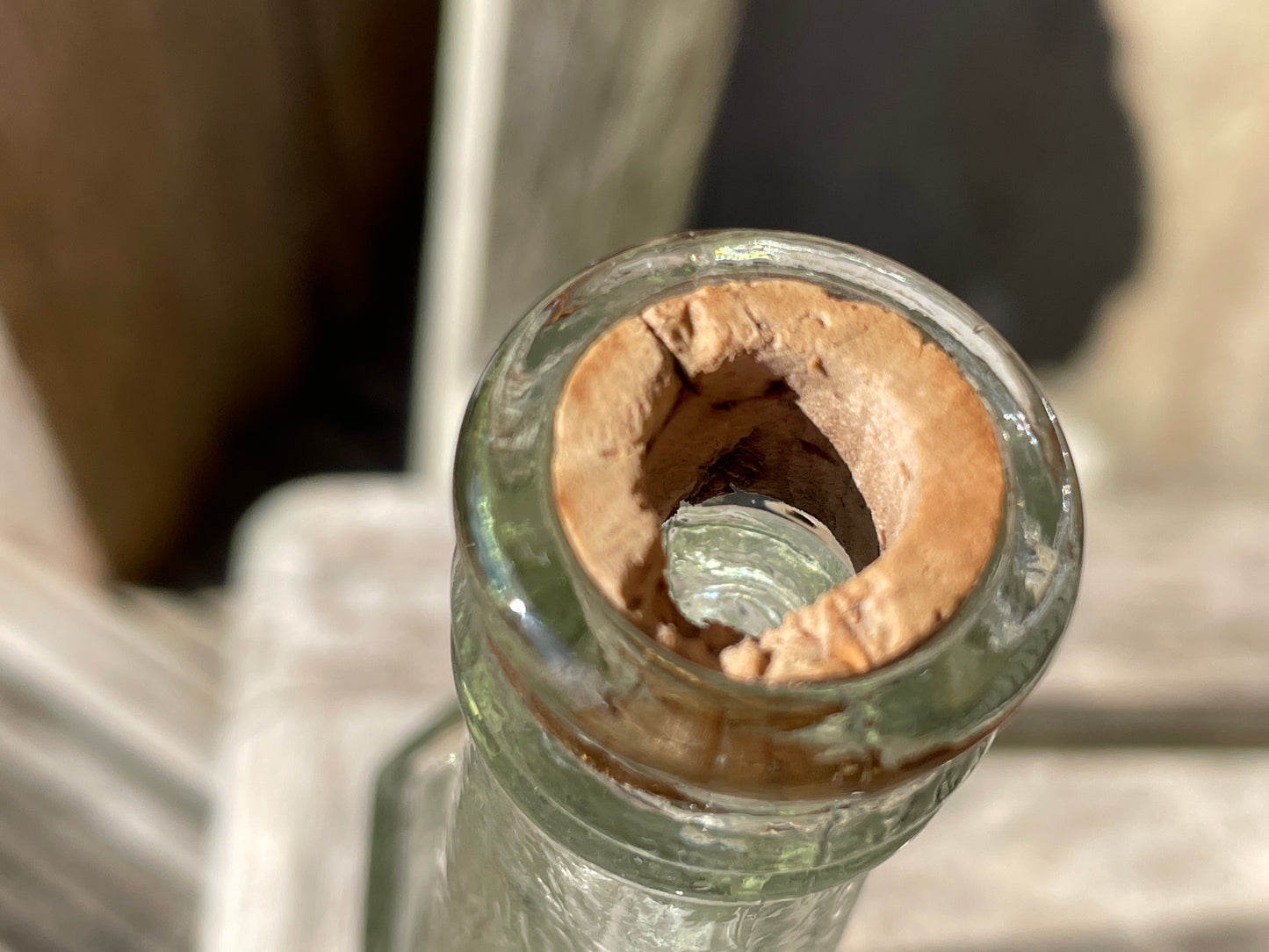 Yates's Wine Lodge and two other long necked antique bottles