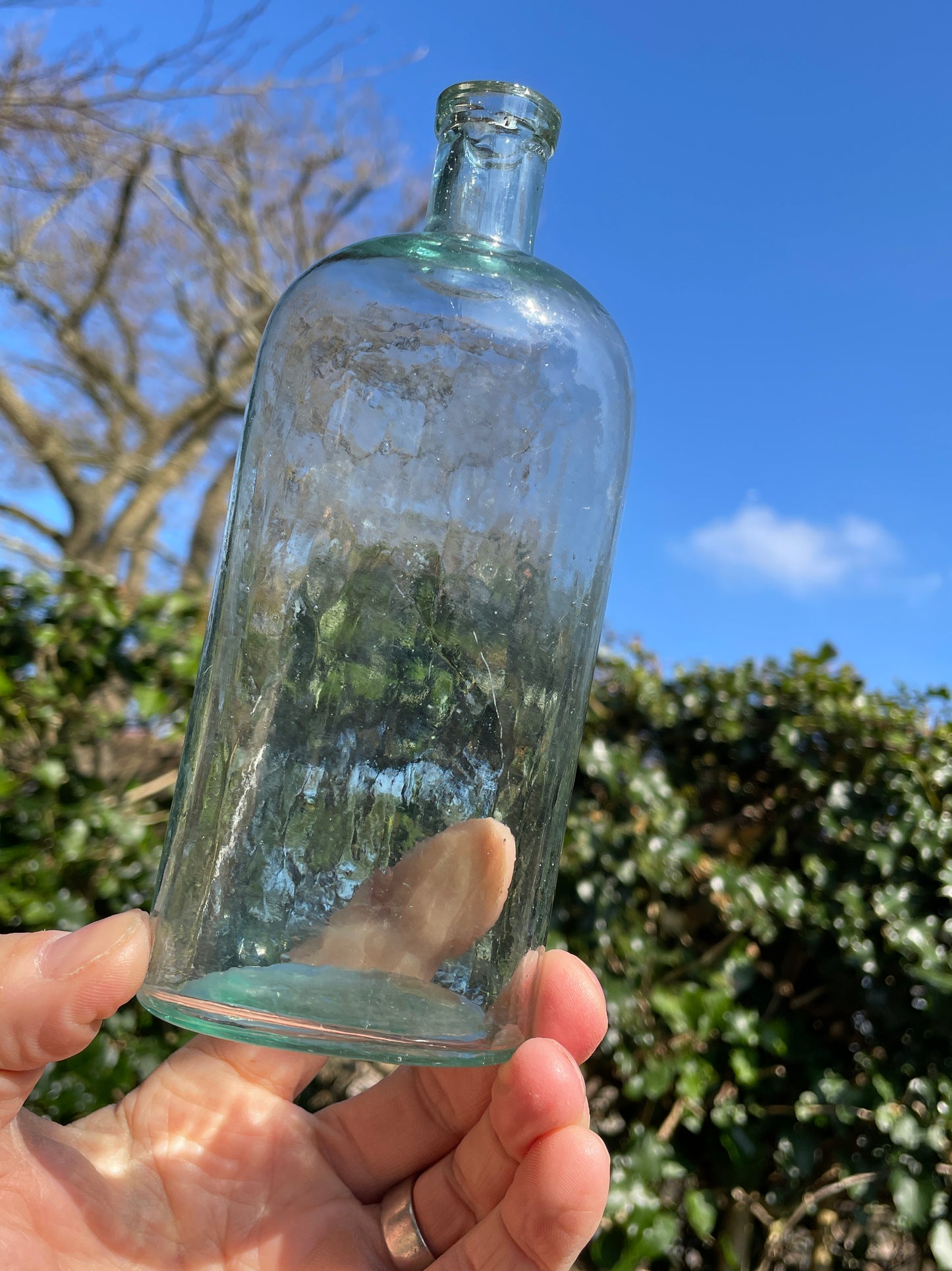 Early Victorian glass bottle in excellent condition 17cm tall