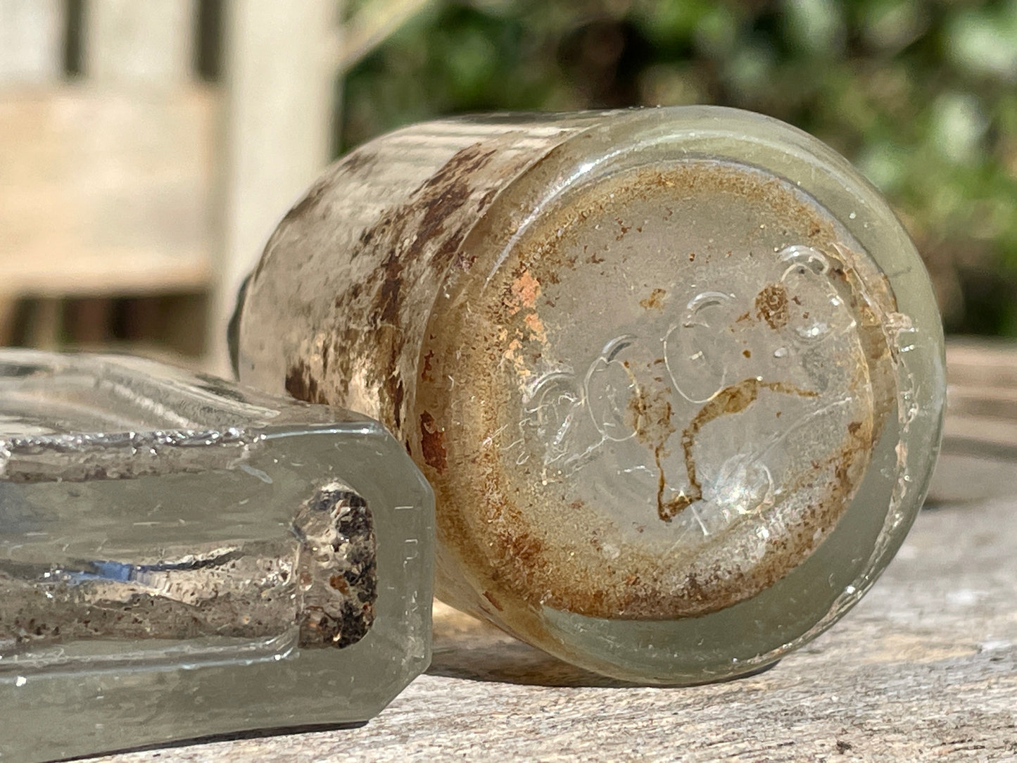 six  19th century glass bottles including Liquid gum Wolverhampton Reade Brothers and American examples