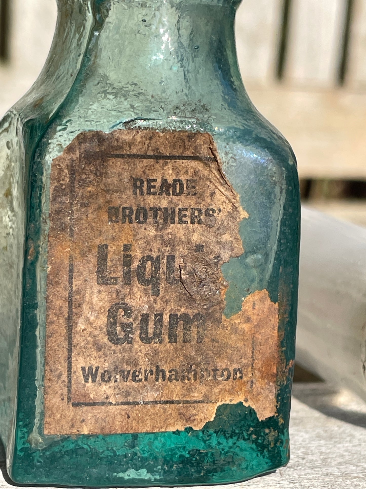 six  19th century glass bottles including Liquid gum Wolverhampton Reade Brothers and American examples