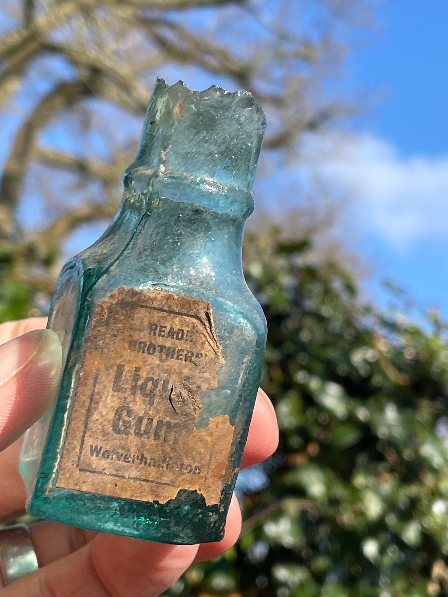 six  19th century glass bottles including Liquid gum Wolverhampton Reade Brothers and American examples