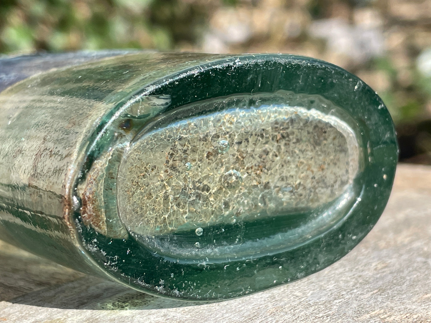 Victorian bottle with original label and cork embossed S&R to base