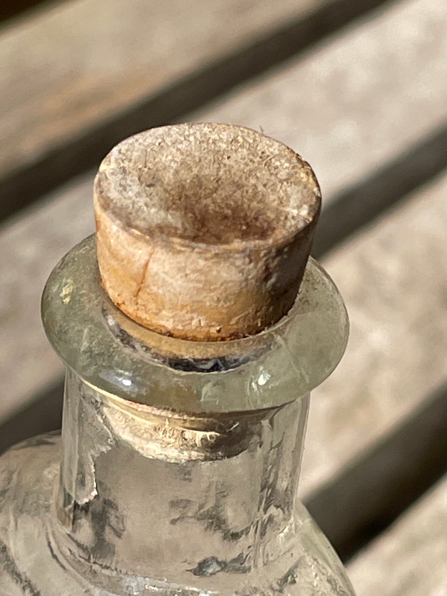 Antique Victorian bottle with original label and cork stopper 11cm tall