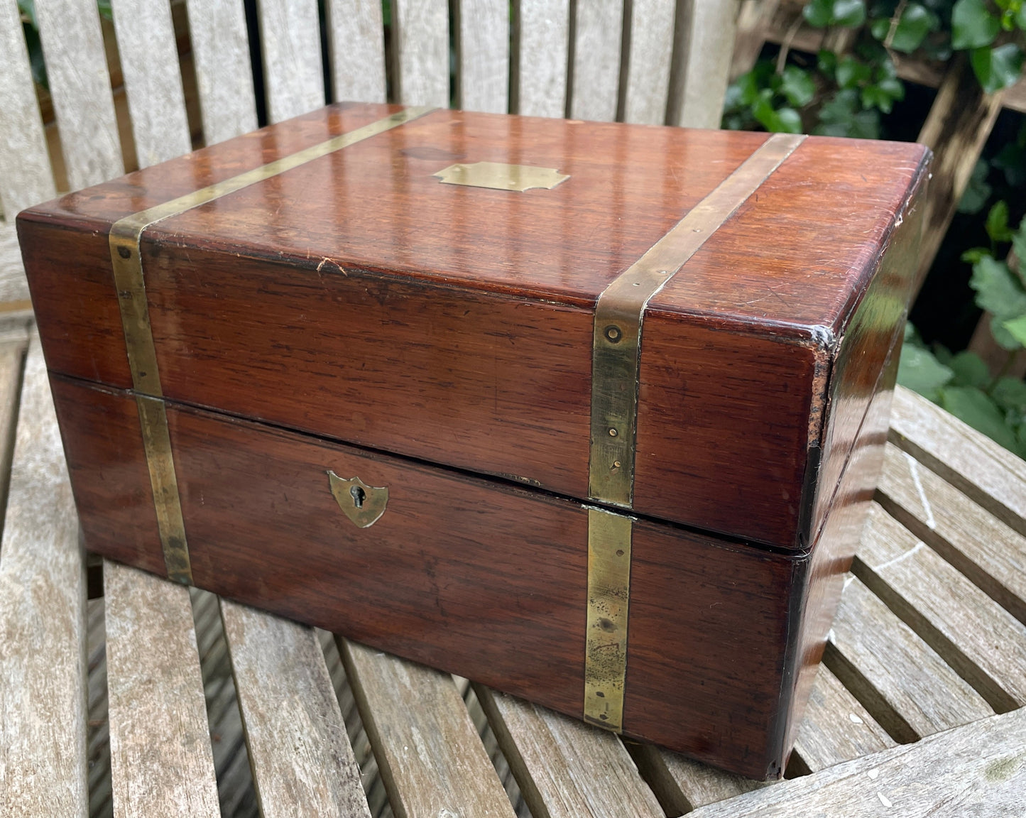 A Victorian Mahogany Campaign Style Workbox With Brass Strap Mounts and Vacant Cartouche 25x19x13cm High