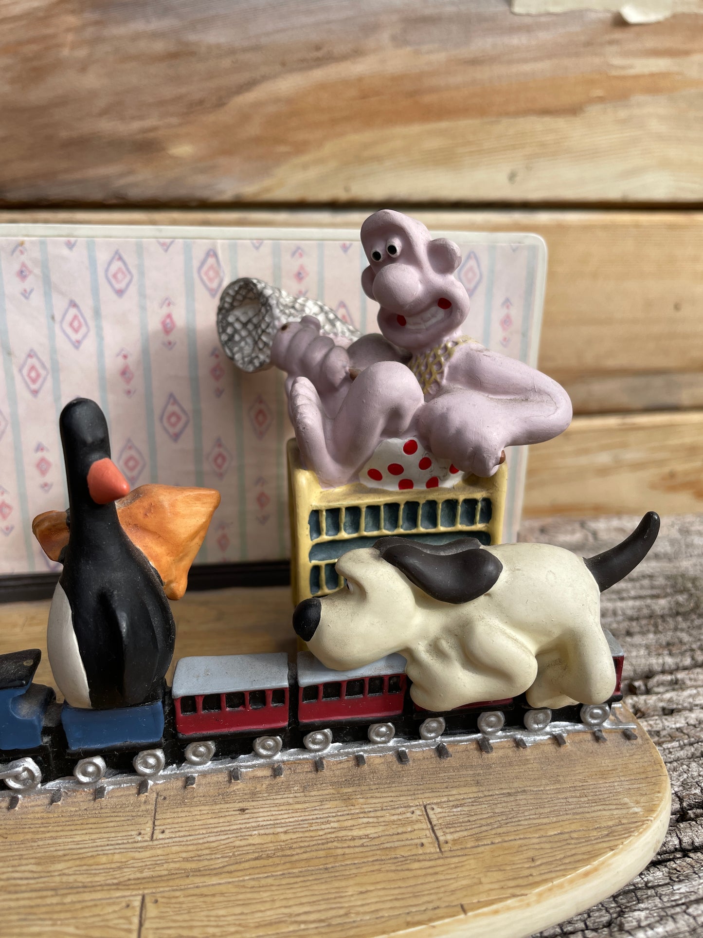 Vintage Wallace and Gromit Ornament by C and T.M. depicting train chase scene