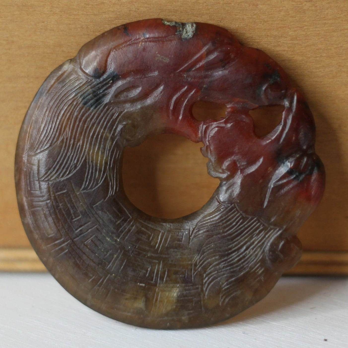 A Chinese Red Hardstone Bi Disc/Pendant 6.5cm Across