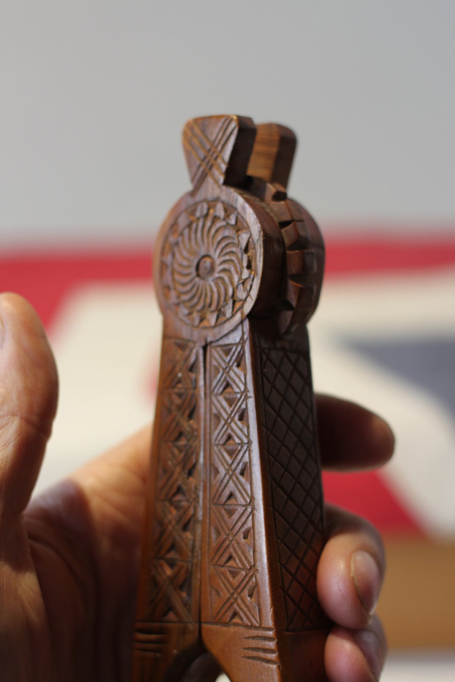 A Set of Vintage Folk Art Hand Carved Wooden Nutcrackers With Decorative Carvings 20cm Long