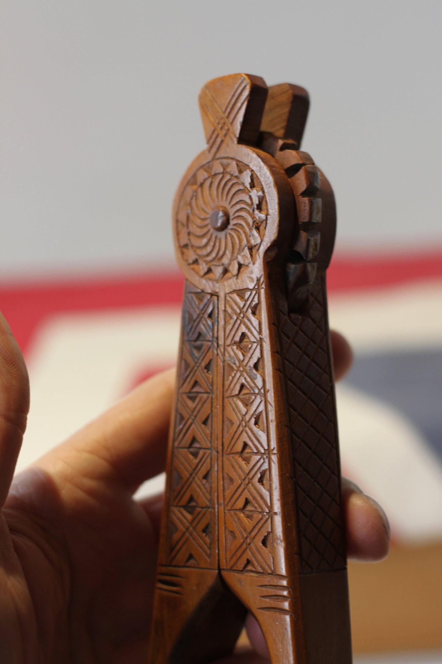 A Set of Vintage Folk Art Hand Carved Wooden Nutcrackers With Decorative Carvings 20cm Long