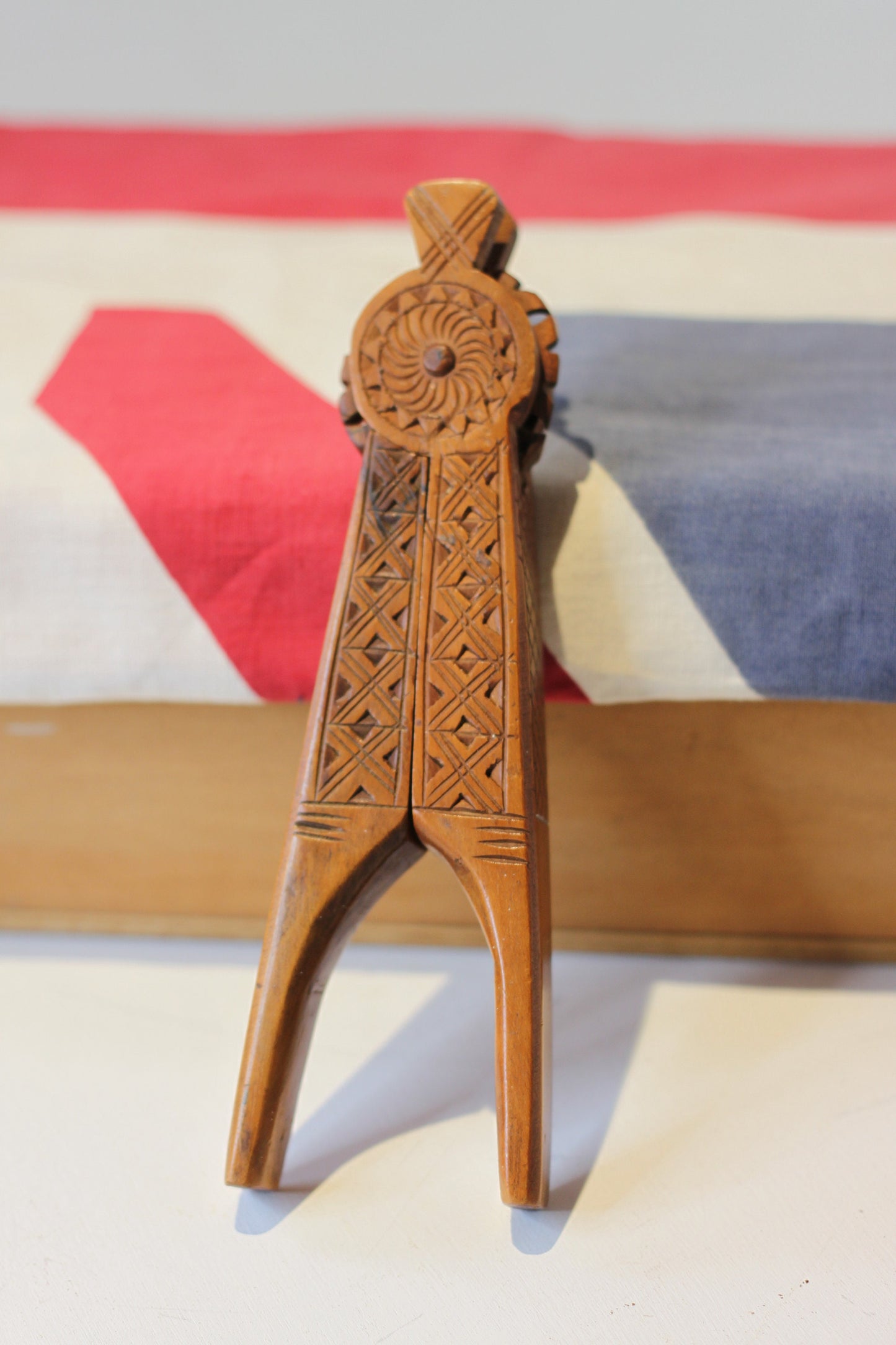 A Set of Vintage Folk Art Hand Carved Wooden Nutcrackers With Decorative Carvings 20cm Long