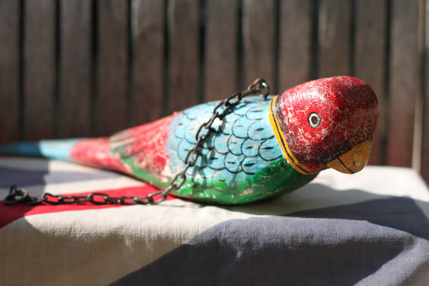 A Hand Made and Painted Colourful Hanging Wooden Parrot 43cm Long