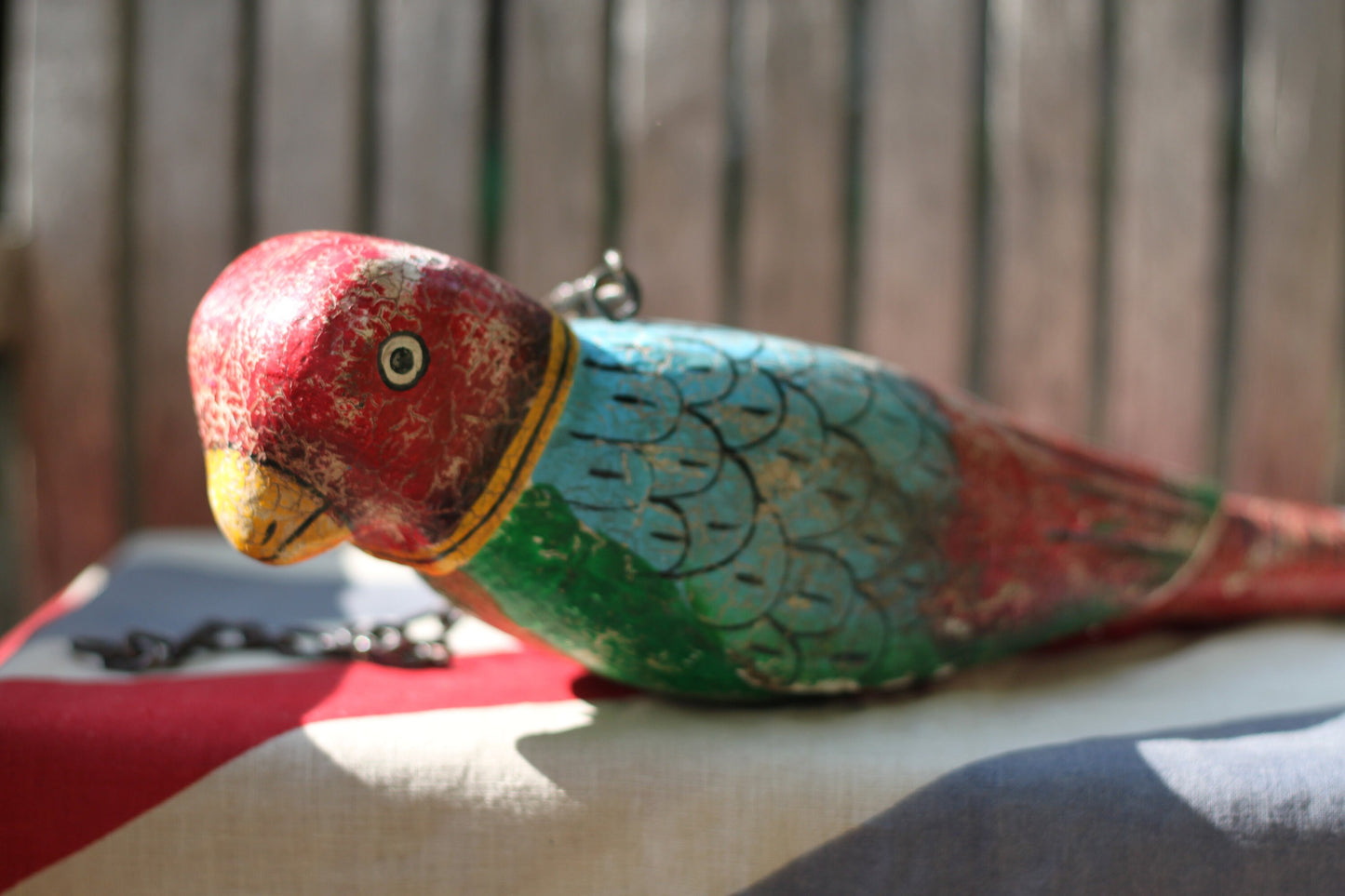 A Hand Made and Painted Colourful Hanging Wooden Parrot 43cm Long