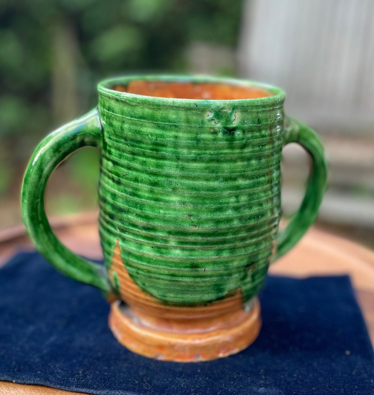 A 19th Century Green Glazed Two Handled Loving Cup by Edwin Beer Fishley for Fremington Pottery Devon (1832 - 1911) 15.5cm Tall