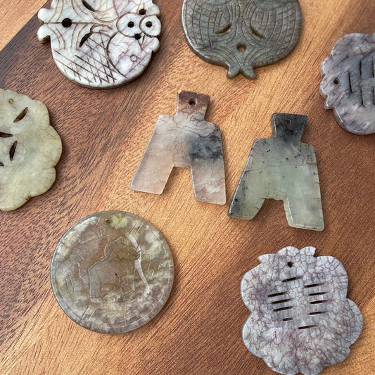 A Large Group of Jade and Nephrite Pendants Average 5cm Diameter