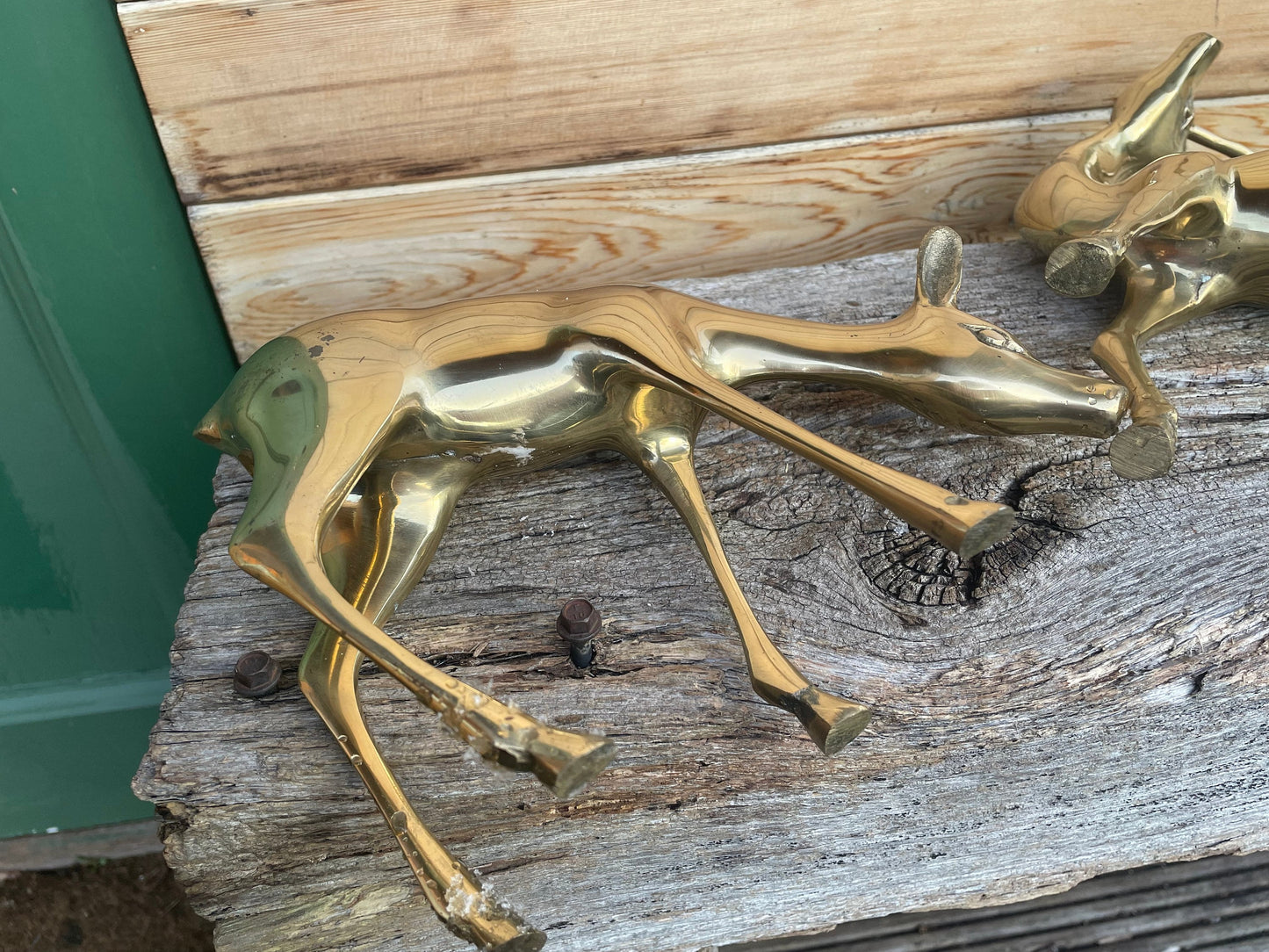 A Pair of Brass Reindeers Largest 34cm Tall