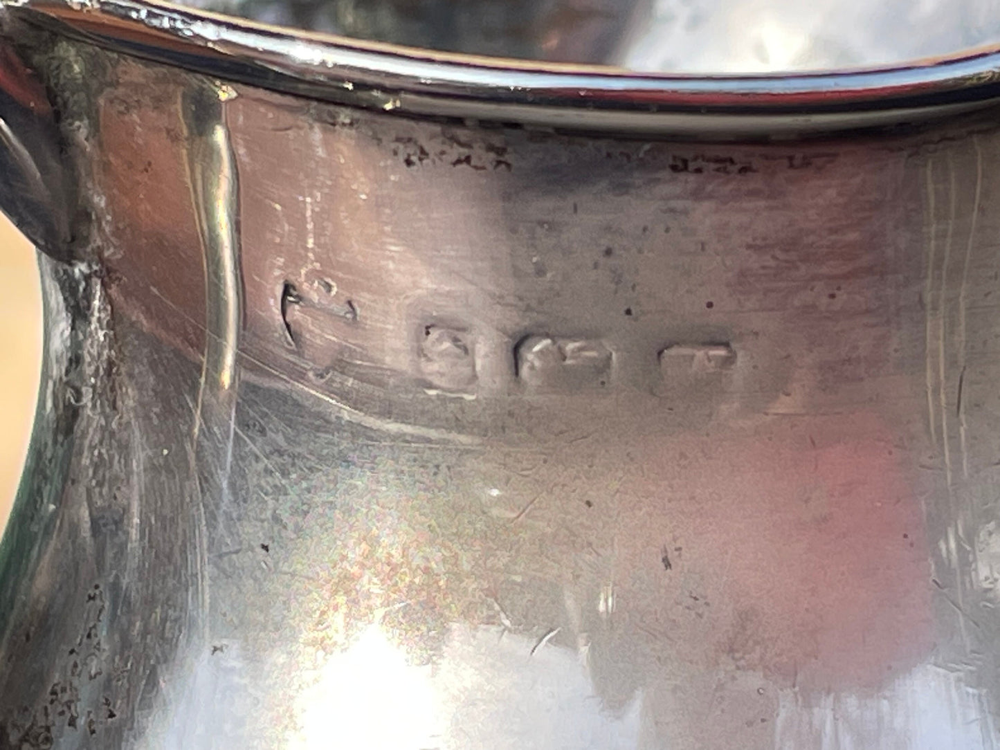A Small Solid Silver Cream Jug Made in Birmingham 1921 (very rubbed Assay marks) 9cm Tall -81grams